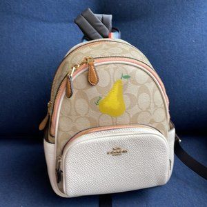 Coach Mini Court Backpack In Signature Canvas With Pear Light Khaki Chalk Multi